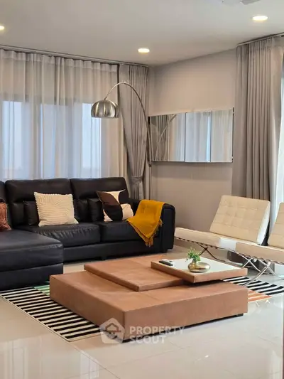 Modern living room with stylish furniture and elegant decor