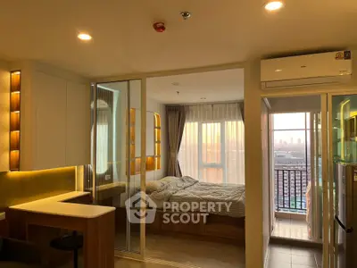 Modern apartment interior with cozy bedroom and balcony view at sunset