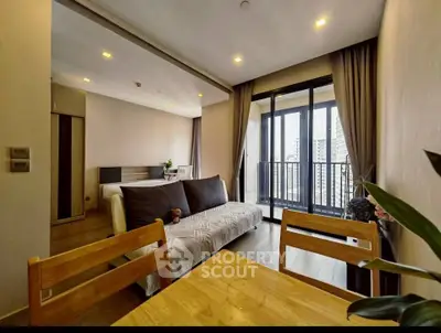Modern living room with balcony view in high-rise apartment