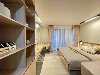 Modern bedroom with stylish wooden furniture and cozy decor, perfect for a serene living experience.