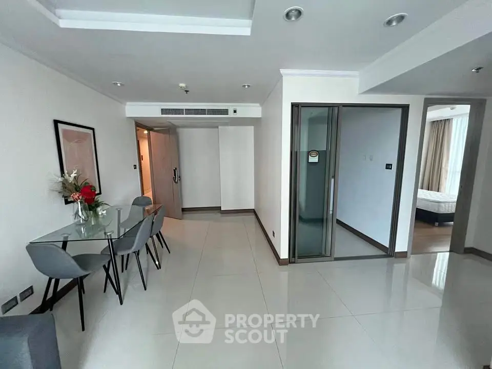 Spacious modern apartment with open dining area and elegant decor