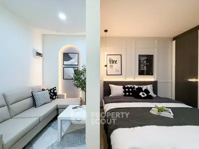 Modern studio apartment with stylish decor and cozy living area