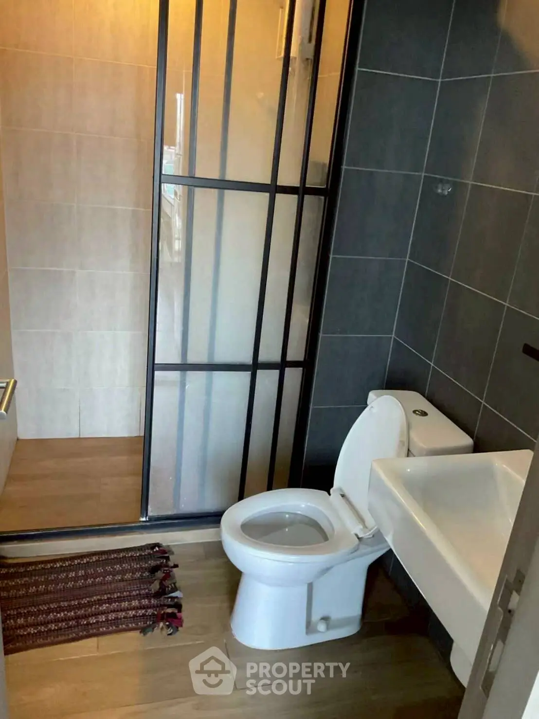 Modern bathroom with sleek design and glass shower partition