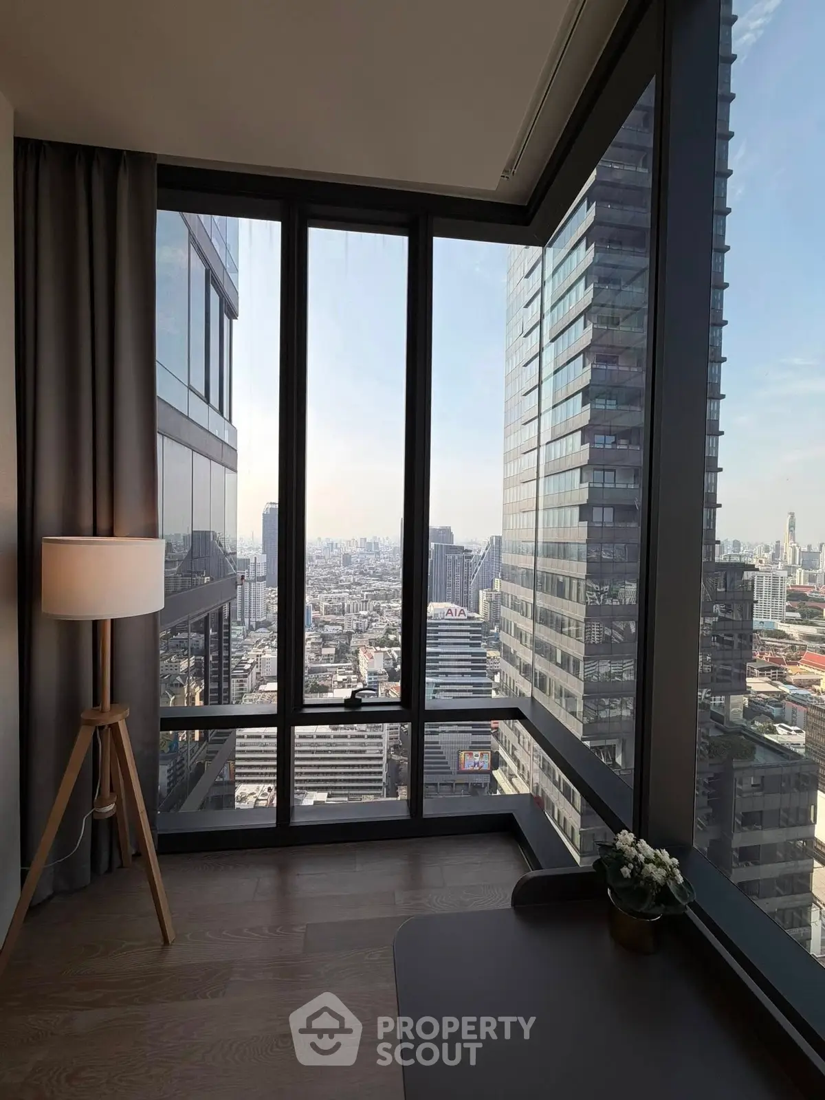 Stunning corner unit with floor-to-ceiling windows offering breathtaking city views.