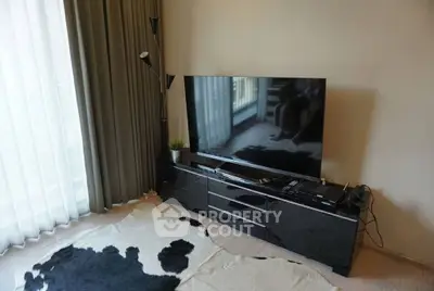 Modern living room with sleek TV setup and stylish decor