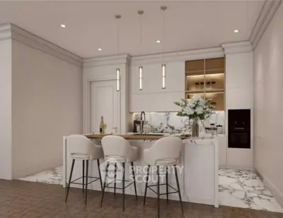 Luxurious modern kitchen with marble island and elegant bar stools in a sophisticated open layout.