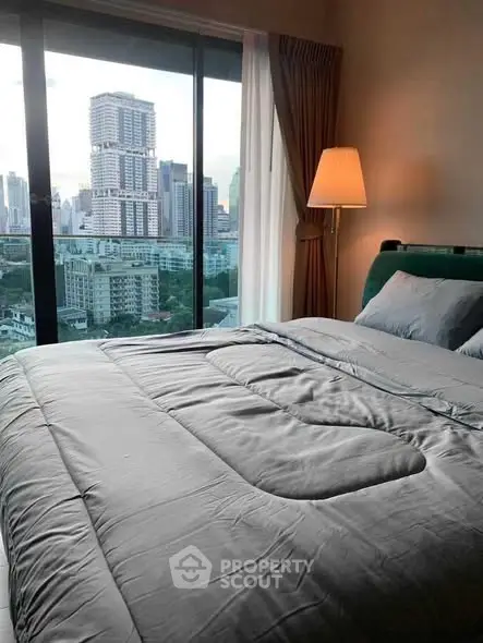 Luxurious bedroom with stunning city view and elegant decor