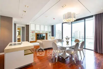 Luxurious open-plan living room with city view, modern kitchen, and elegant dining area.