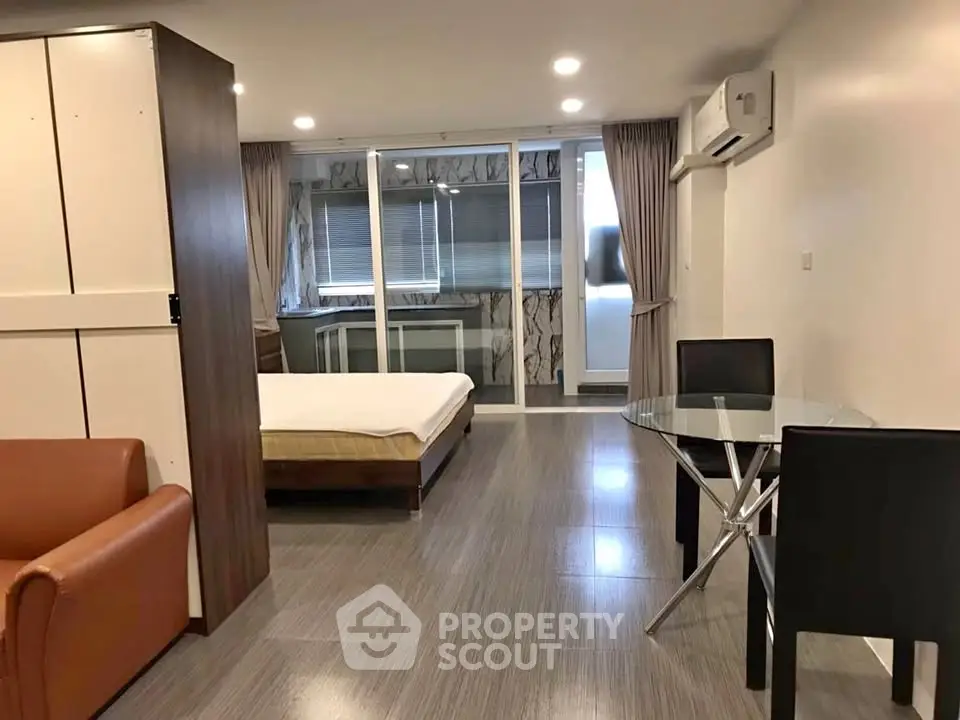 Modern studio apartment with open layout and stylish furnishings