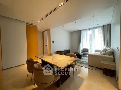 Luxurious modern living room with elegant dining area and natural light