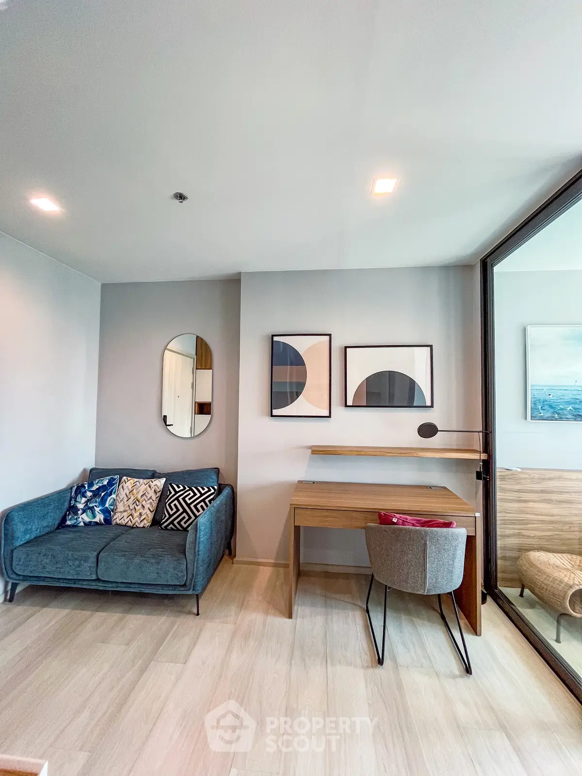 Modern living room with stylish decor and cozy workspace