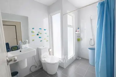 Modern bathroom with sleek fixtures and bright natural lighting