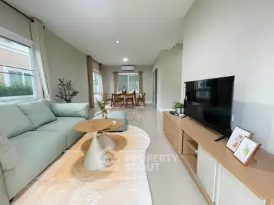 Spacious modern living room with elegant decor and natural light