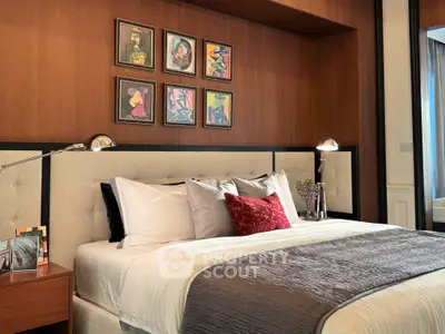 Luxurious bedroom with elegant decor and plush bedding in a modern apartment.