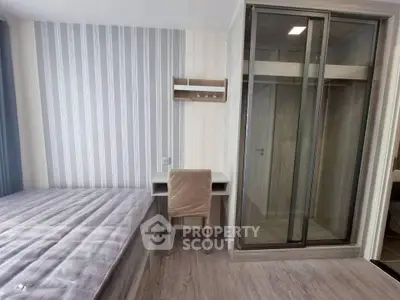 Modern bedroom with stylish decor and built-in wardrobe