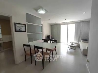 Spacious modern living room with dining area and natural light