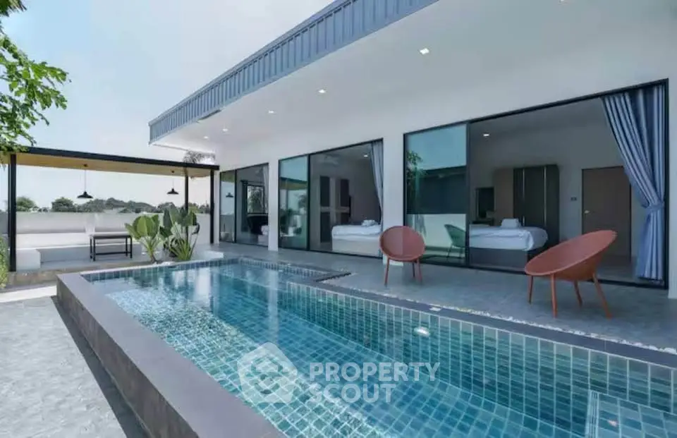 Luxurious modern villa with private pool and spacious outdoor area, perfect for relaxation and entertainment.