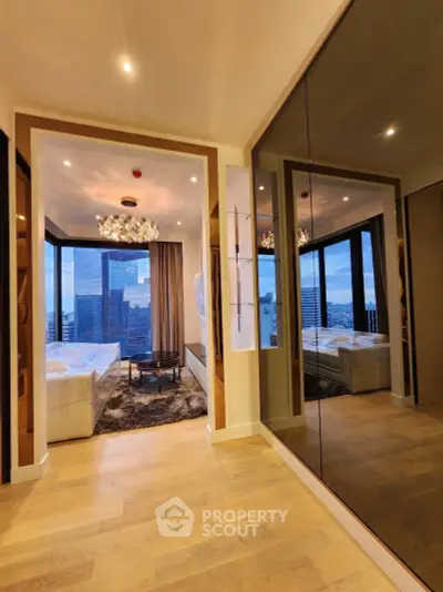 Luxurious bedroom with stunning city view and elegant chandelier lighting