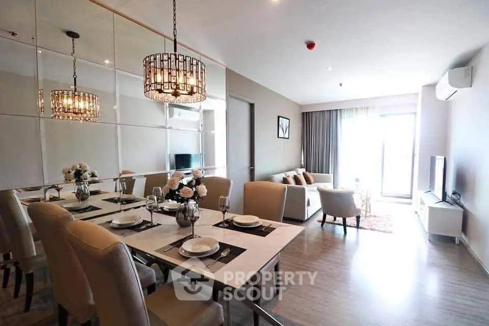 Modern living room with elegant dining area and stylish decor