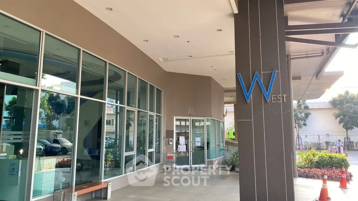 Modern building entrance with glass facade and stylish design