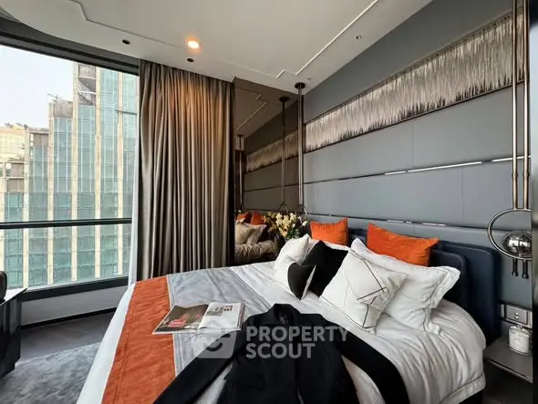 Luxurious modern bedroom with city view, stylish decor, and elegant furnishings.