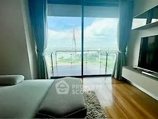 Luxurious bedroom with stunning balcony view and modern decor