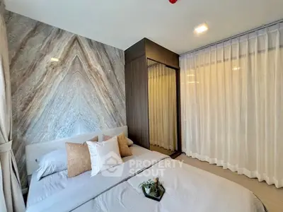 Luxurious bedroom with elegant decor and large mirrored wardrobe