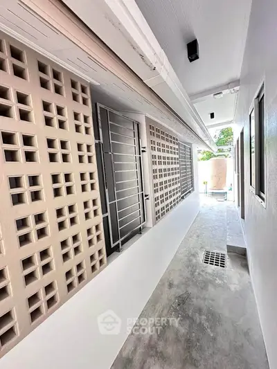 Modern building corridor with unique architectural design and natural light