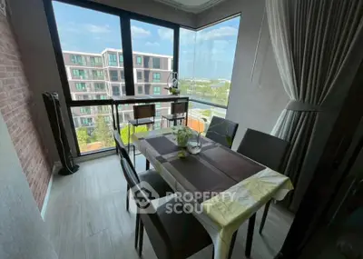Chic dining area with stunning view in modern apartment