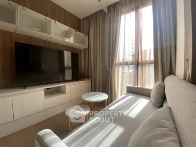 Modern living room with sleek furniture and natural light