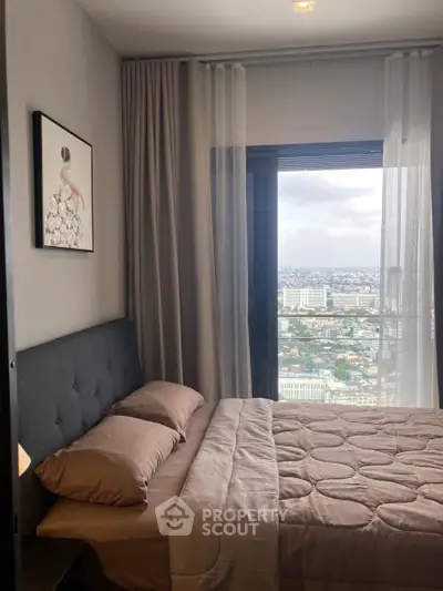 Modern bedroom with stunning city view from large window, featuring elegant decor and cozy bedding.