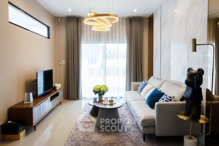 Modern living room with stylish furniture and elegant lighting