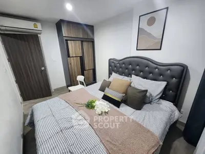 Cozy bedroom with stylish decor and modern furniture, featuring a comfortable bed and elegant wardrobe.