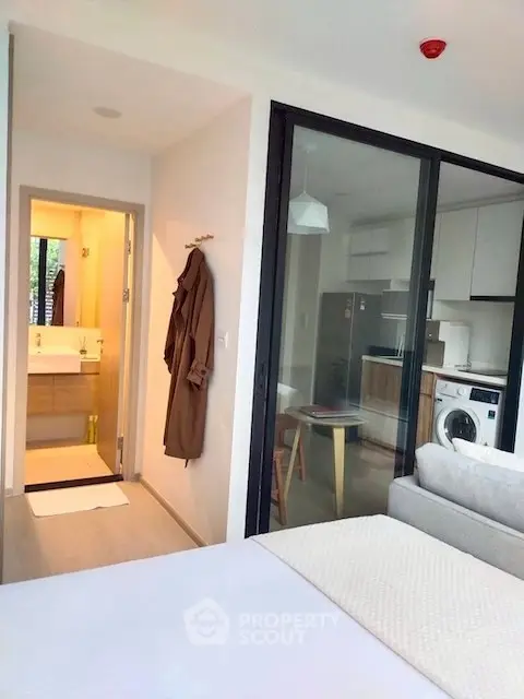 Modern studio apartment with open kitchen and cozy living area