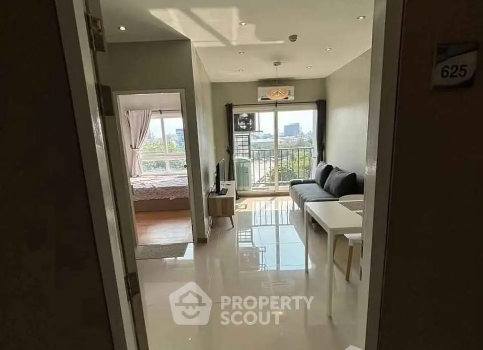 Modern apartment with open living room and balcony view