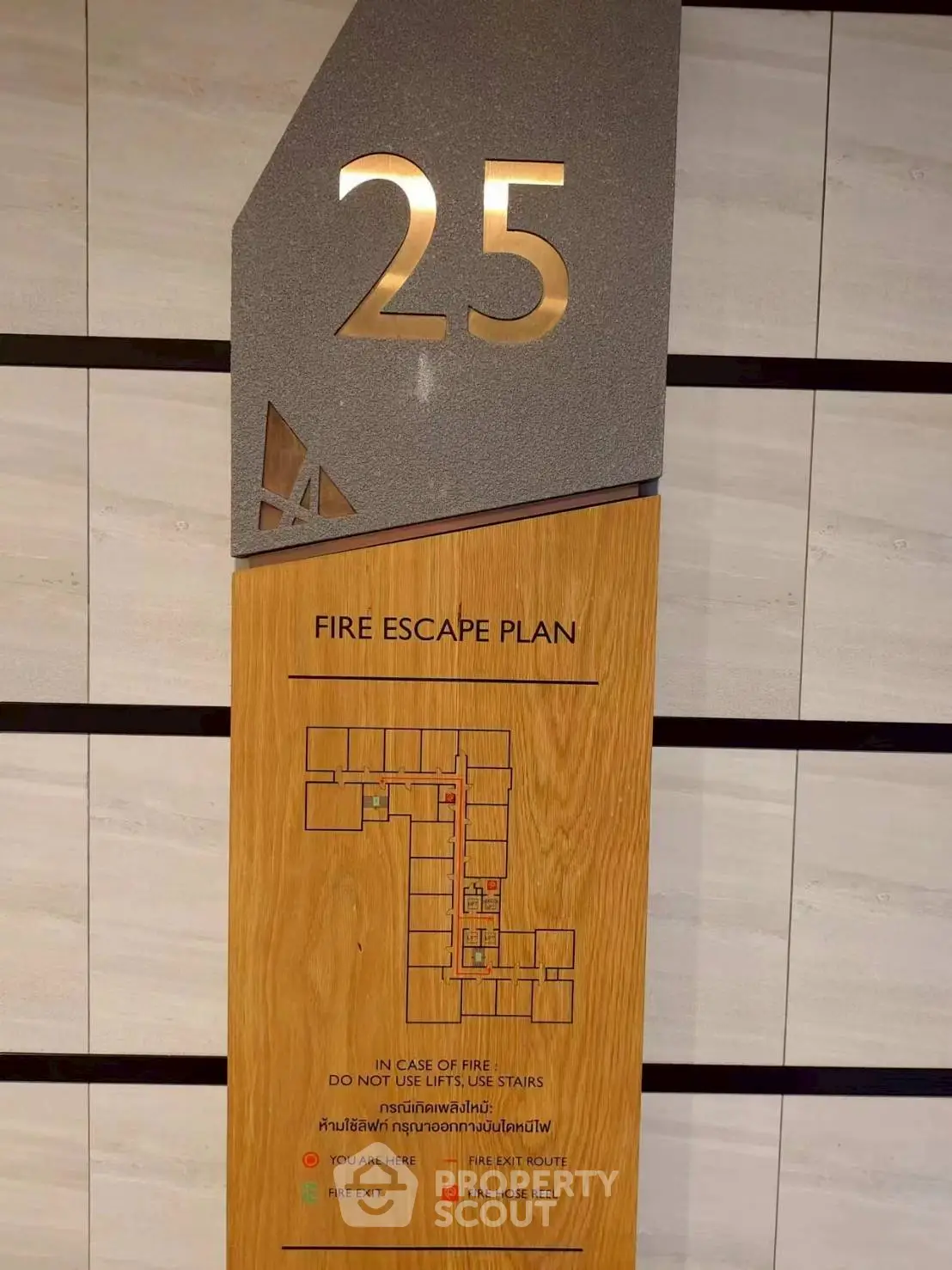 Modern fire escape plan on 25th floor with sleek design and clear instructions.