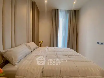 Cozy modern bedroom with elegant decor and soft lighting