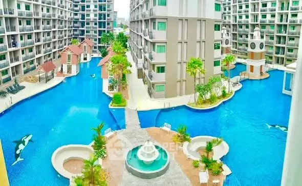 Luxurious apartment complex with stunning pool and landscaped gardens.
