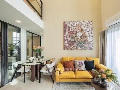 Stylish modern living room with vibrant decor and cozy seating area