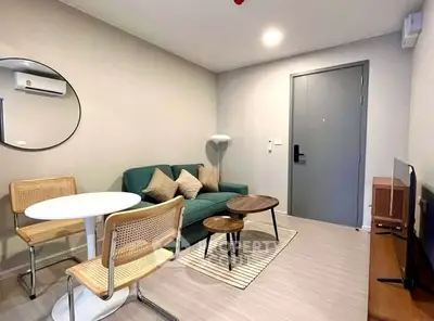 Modern living room with stylish furniture and neutral tones