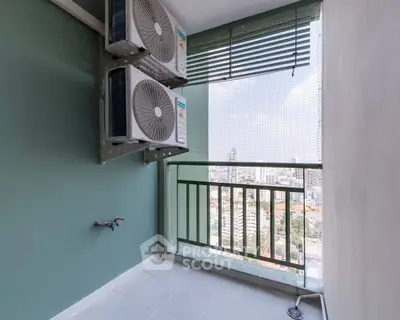 Modern balcony with city view and air conditioning units, perfect for urban living.