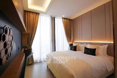 Luxurious modern bedroom with elegant lighting and stylish decor
