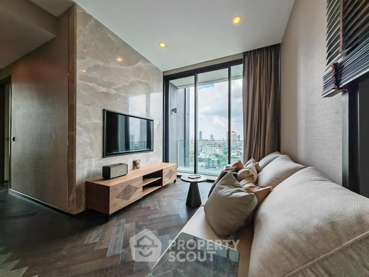 Luxurious living room with modern decor and stunning city view from balcony.