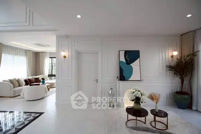 Luxurious modern living room with elegant decor and stylish furniture, perfect for sophisticated living.