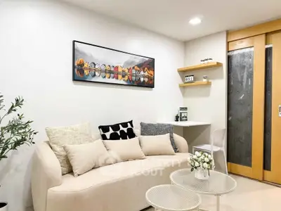 Stylish modern living room with cozy sofa and elegant decor