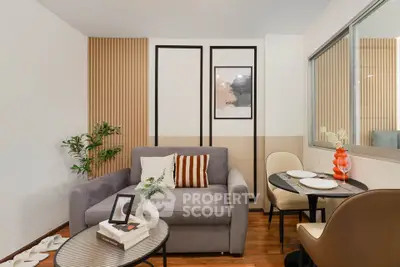 Modern living room with stylish decor and cozy seating area, perfect for relaxation and entertaining.