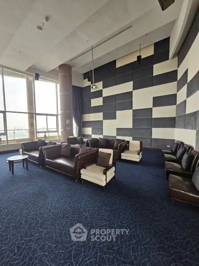 Luxurious high-rise lounge with modern seating and panoramic city views