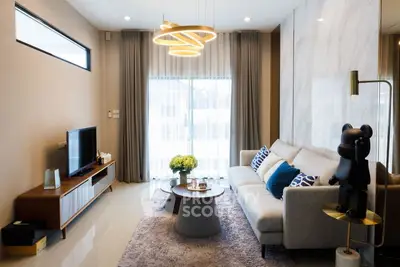 Modern living room with stylish decor and cozy seating area.