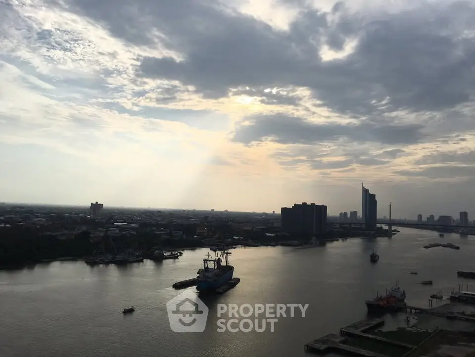 Stunning river view with city skyline, perfect for high-rise living.