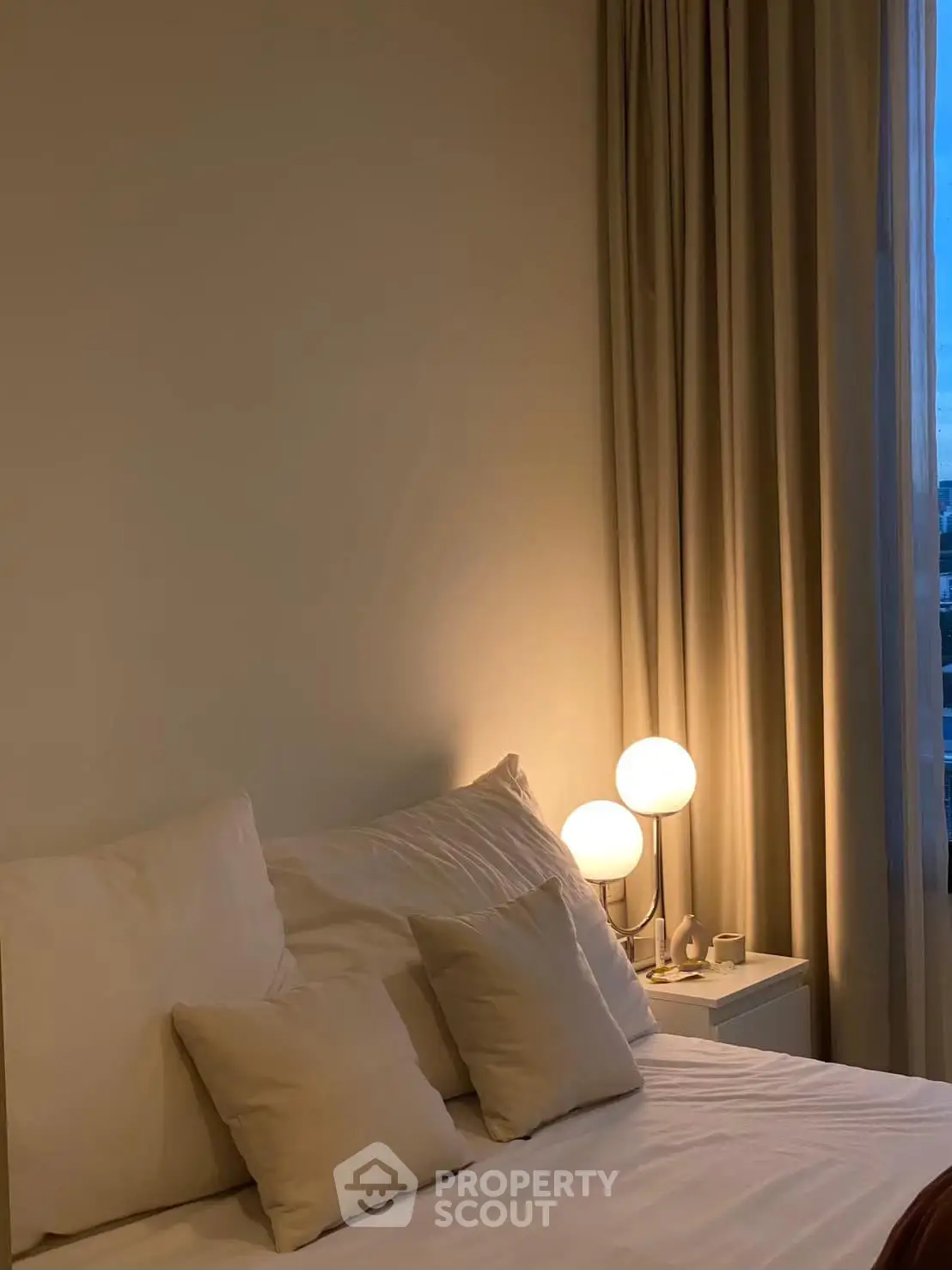 Cozy bedroom with soft lighting and elegant decor